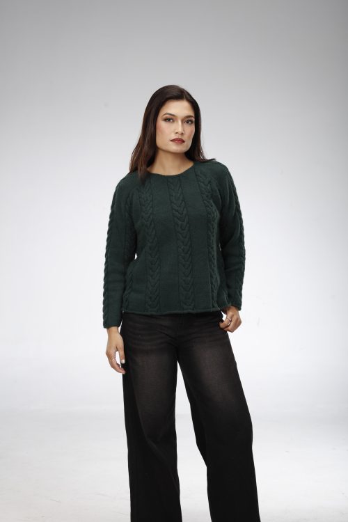 Everest Cashmere: Woman in a dark green cable-knit sweater